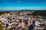 Panoramic aerial view of Salzburg Old Town, Salzburg Cathedral and the Salzach River in Austria.