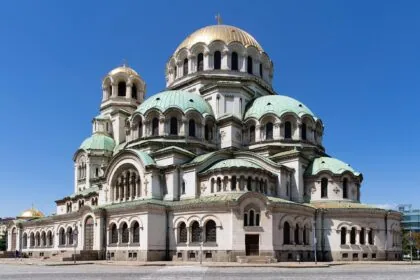 Alexander Nevsky Cathedral in Sofia under a clear blue sky.