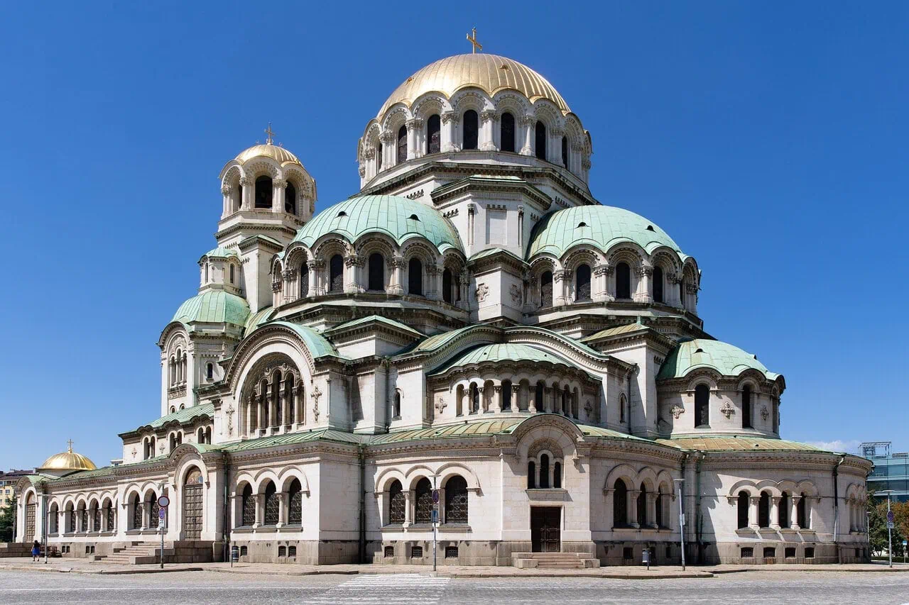 Alexander Nevsky Cathedral in Sofia under a clear blue sky.