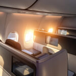 Business class airline suite illustrating reward flights and points travel using Seats.aero and Rooms.aero