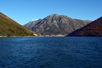 Scenic view across the Bay of Kotor surrounded by mountains