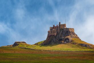 Lindisfarne Castle on Holy Island surrounded by the Northumberland landscape