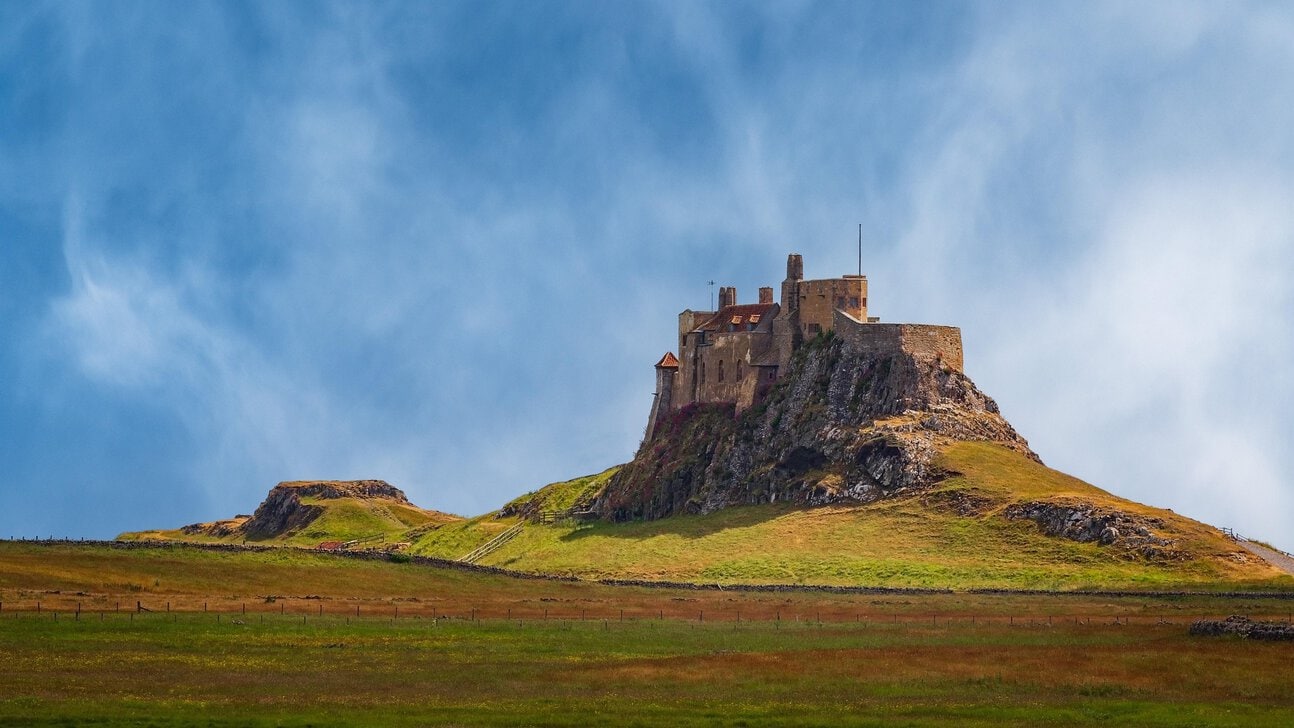 Lindisfarne Castle on Holy Island surrounded by the Northumberland landscape