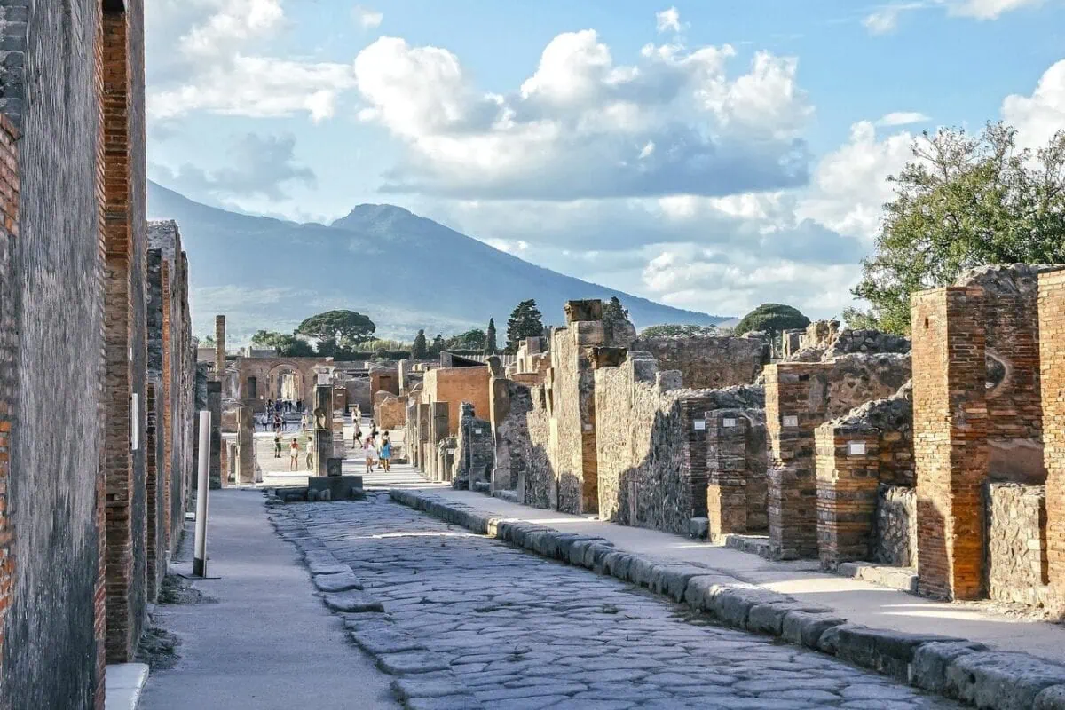 Ancient streets of Pompeii with Mount Vesuvius behind