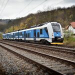 České dráhy passenger train travelling through the Czech countryside