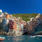 Colourful waterfront and harbour at Riomaggiore viewed from the sea in Cinque Terre.
