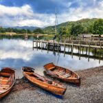 Wooden rowing boats beside a lake in the Lake District