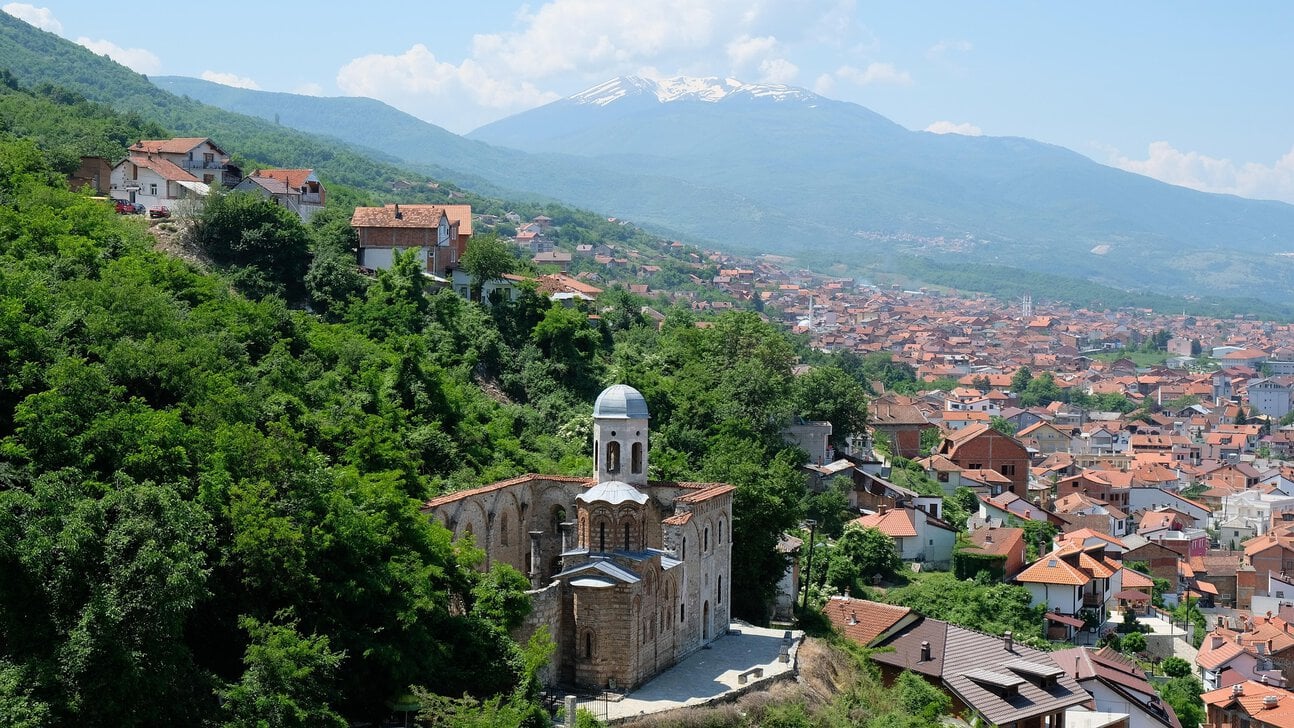 Historic church overlooking Prizren with the Šar Mountains in the background