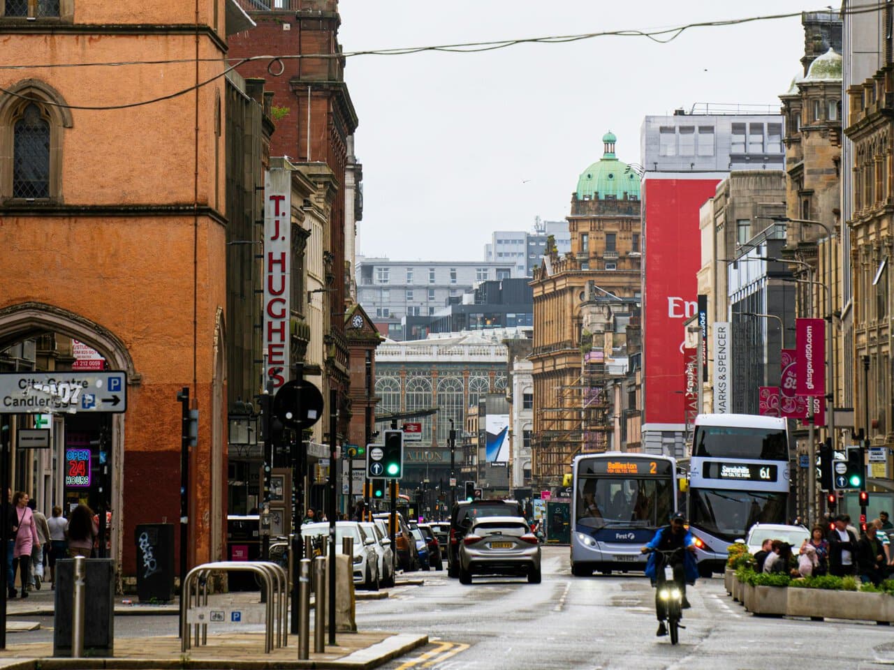 Glasgow city centre with buses and cyclists