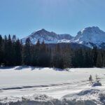 Frozen Black Lake surrounded by Durmitor mountains
