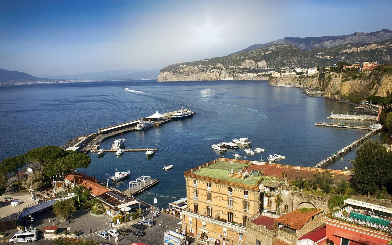 View across the Bay of Naples from Sorrento with boats in the harbour