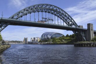 The Tyne Bridge spanning the River Tyne with Newcastle Quayside beyond
