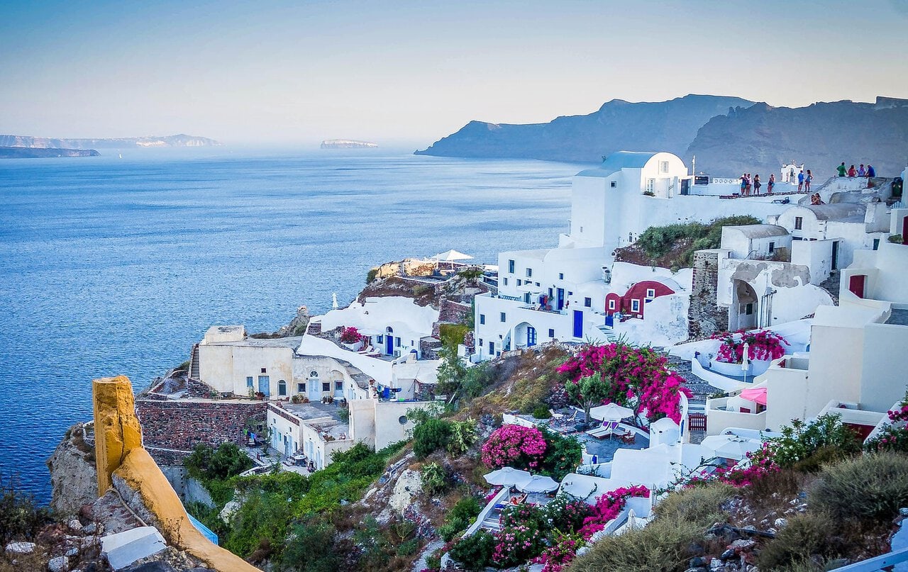 Whitewashed buildings overlooking the caldera in Santorini, Greece