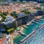 Sorrento coastline with beaches and swimming platforms beneath the cliffs