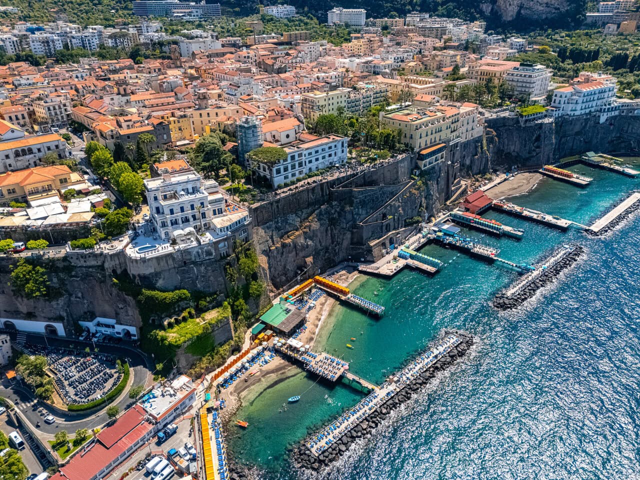 Sorrento coastline with beaches and swimming platforms beneath the cliffs