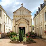 Historic church and traditional buildings in Bergerac old town, Dordogne, France