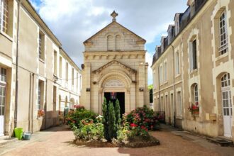 Historic church and traditional buildings in Bergerac old town, Dordogne, France