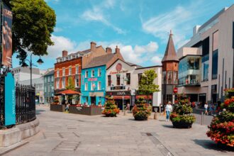 Colourful shops and cafés in Cork city centre, Ireland.