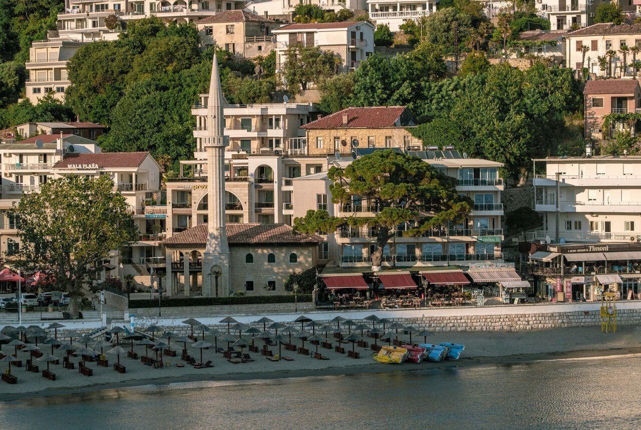 Ulcinj waterfront with mosque and sandy beach