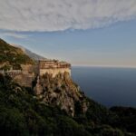 Simonopetra Monastery perched dramatically on the cliffs of Mount Athos overlooking the Aegean Sea.