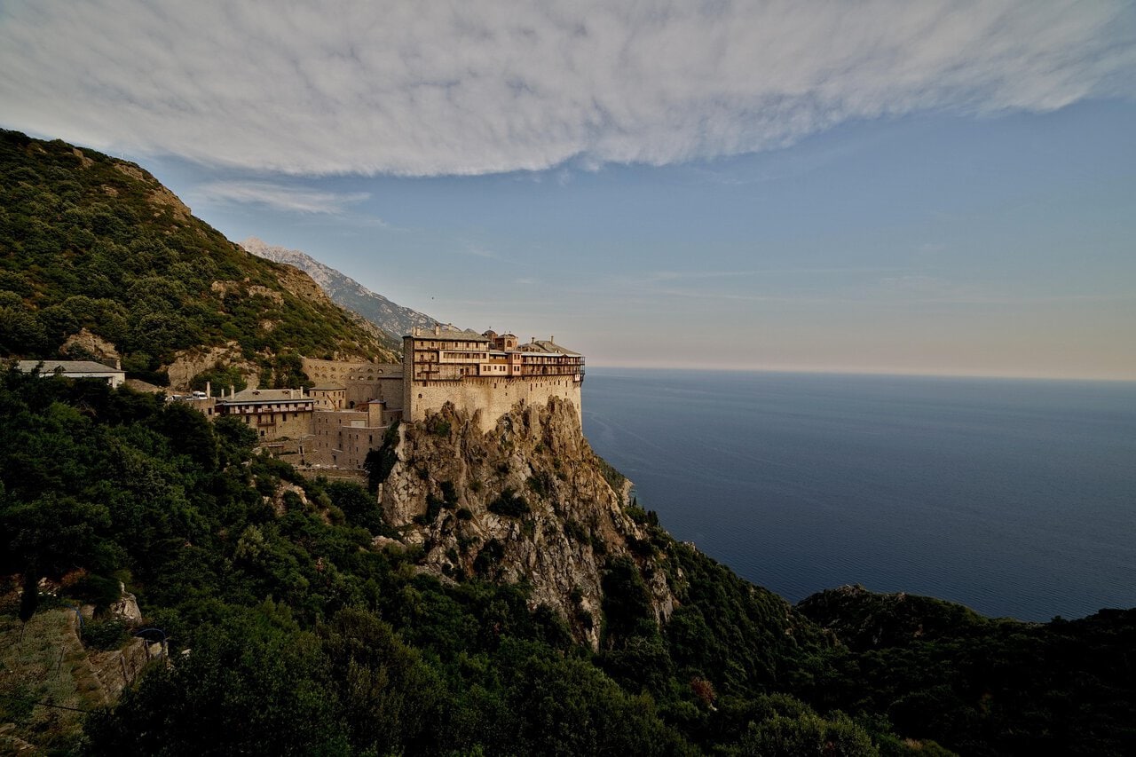 Simonopetra Monastery perched dramatically on the cliffs of Mount Athos overlooking the Aegean Sea.