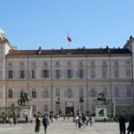 Front entrance of the Royal Palace of Turin overlooking Piazza Castello in the historic centre of Turin, Italy.