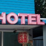 Hotel sign representing accommodation booking and hotel price comparison