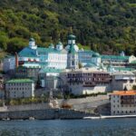 St Panteleimon Monastery on Mount Athos with its distinctive green domes overlooking the waterfront.
