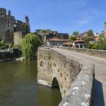 Château de Clisson and the medieval stone bridge spanning the River Sèvre near Nantes, France.