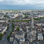 Aerial view of Nantes city centre with Saint Nicholas Church and surrounding streets.