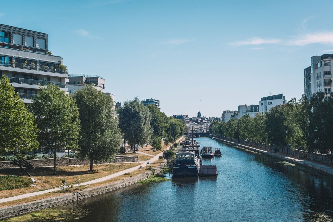 The Canal Saint-Martin running through Rennes with boats and riverside paths.
