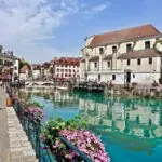 Colourful canal-side houses and boats in the Old Town of Annecy, France