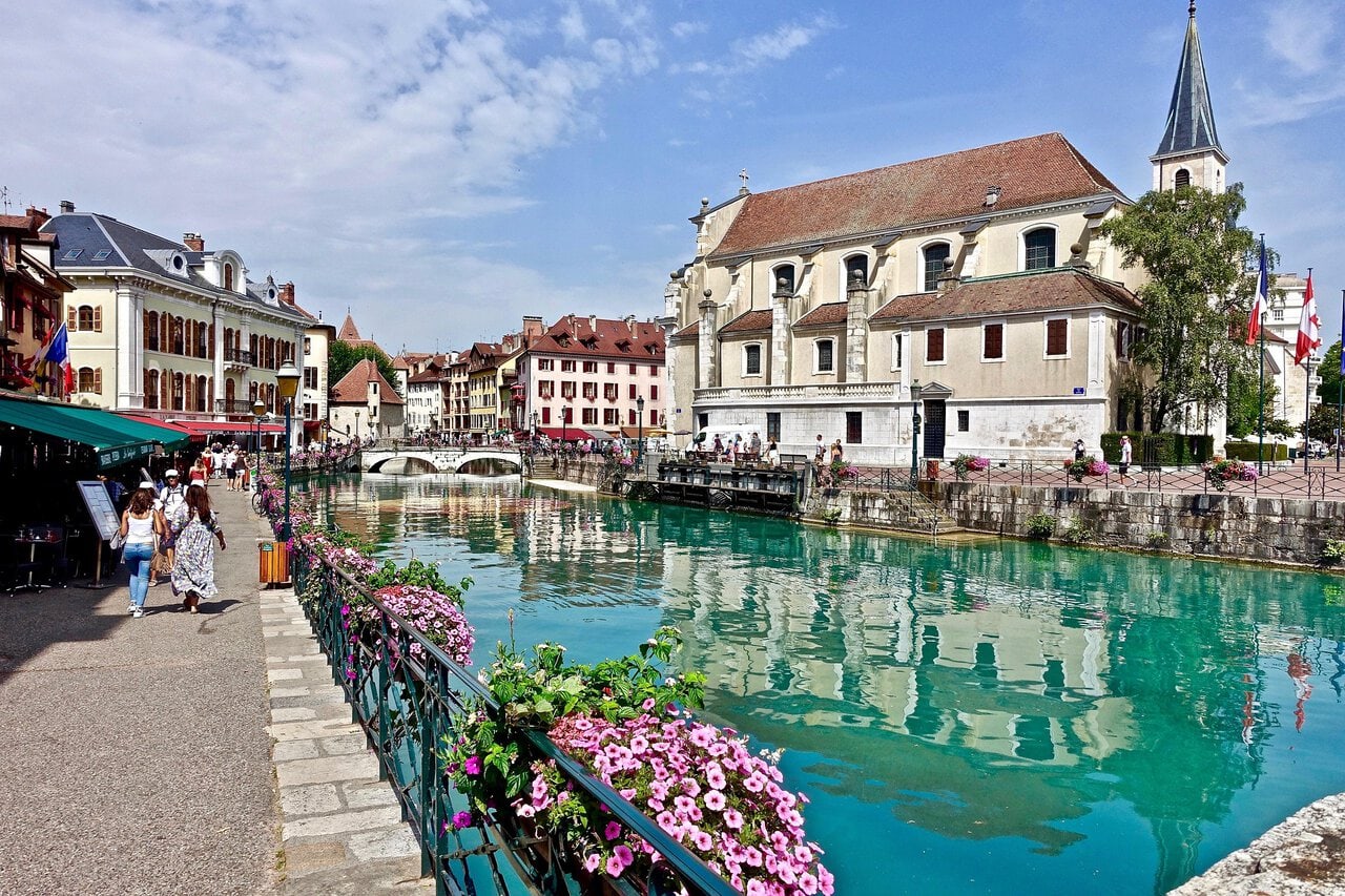 Colourful canal-side houses and boats in the Old Town of Annecy, France