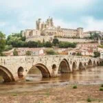 View of Béziers Cathedral and the historic Pont Vieux crossing the River Orb