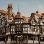 Historic black-and-white timber-framed buildings along the Chester Rows in Chester city centre