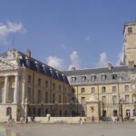 Historic half-timbered houses and the Palace of the Dukes of Burgundy in Dijon, France