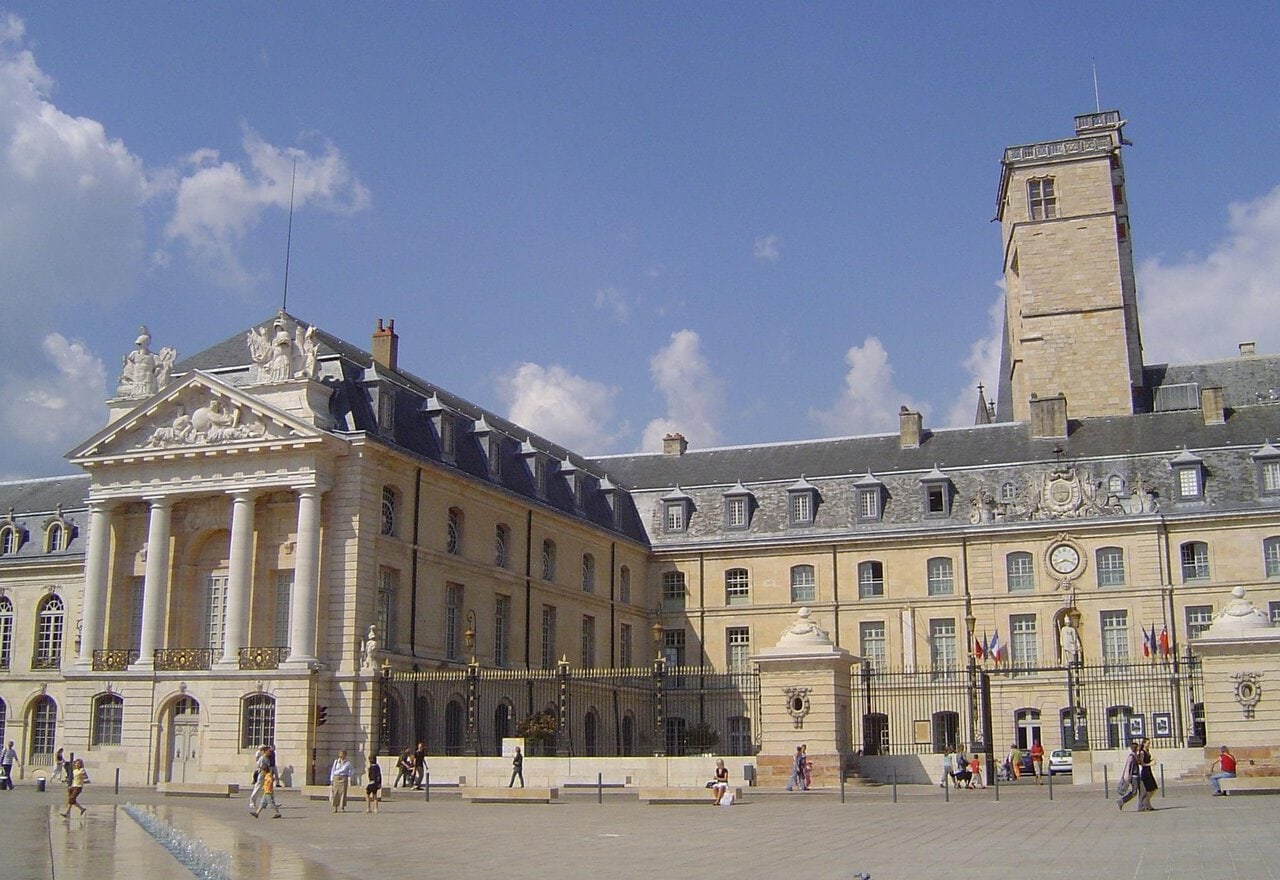 Historic half-timbered houses and the Palace of the Dukes of Burgundy in Dijon, France