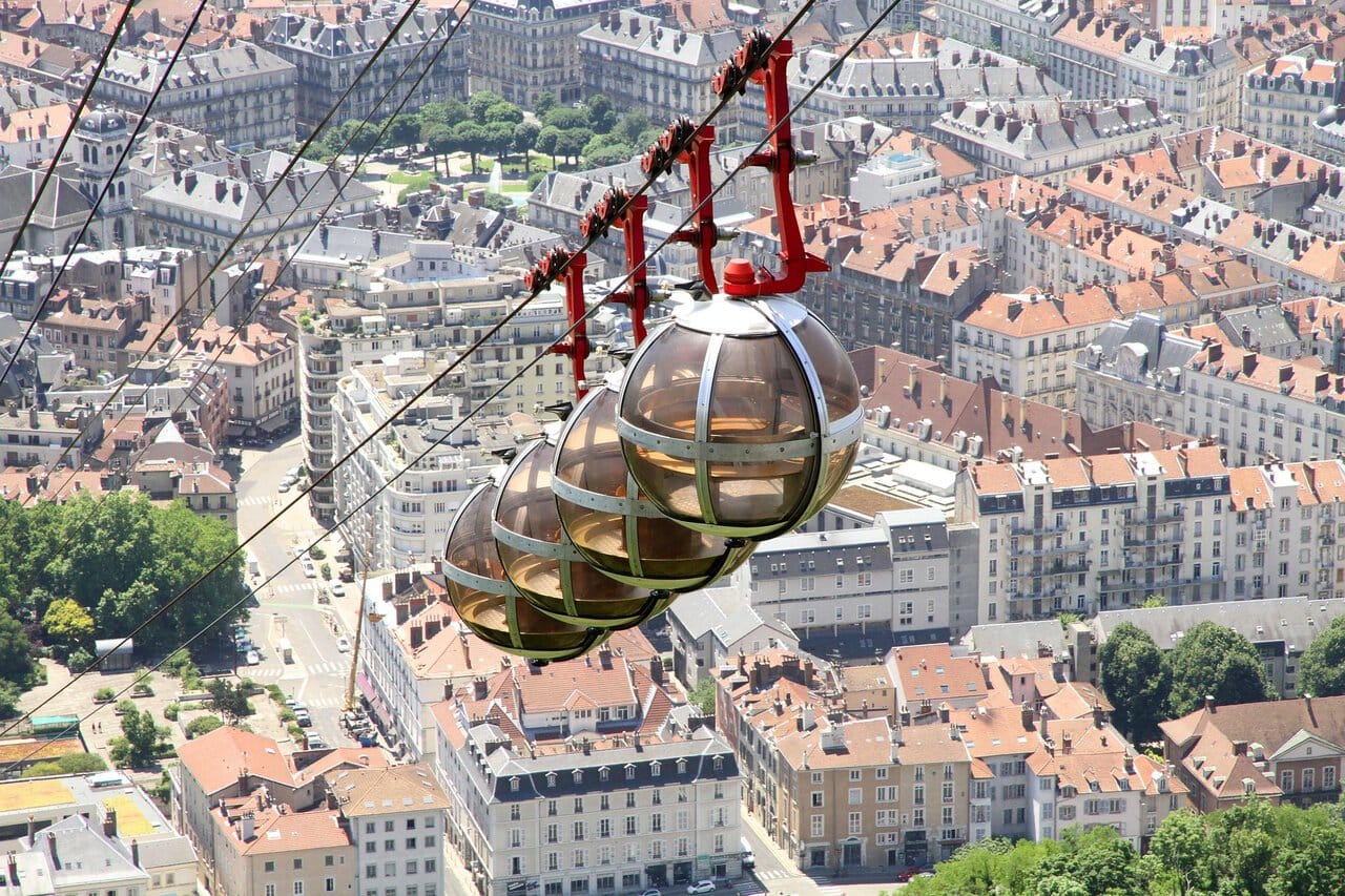 View over Grenoble with the Bastille Cable Car and surrounding Alps