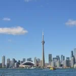 The Toronto skyline with the CN Tower featured in the Things To Do In Toronto Guide.