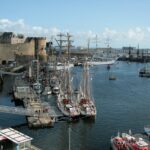 Tall ships and sailing vessels moored in the harbour at Brest, Brittany, France.