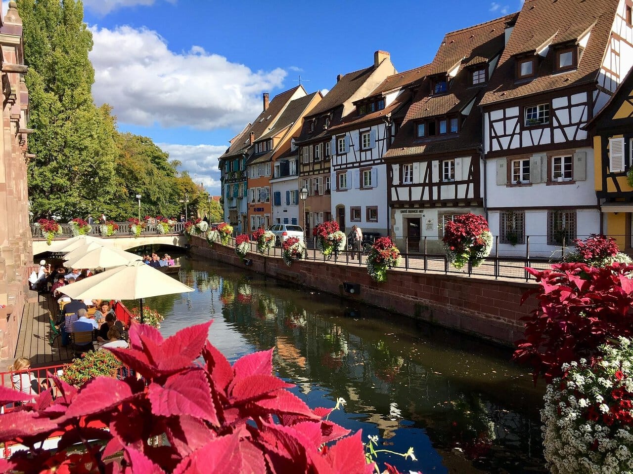 Colourful half-timbered houses lining the Little Venice canal in Colmar