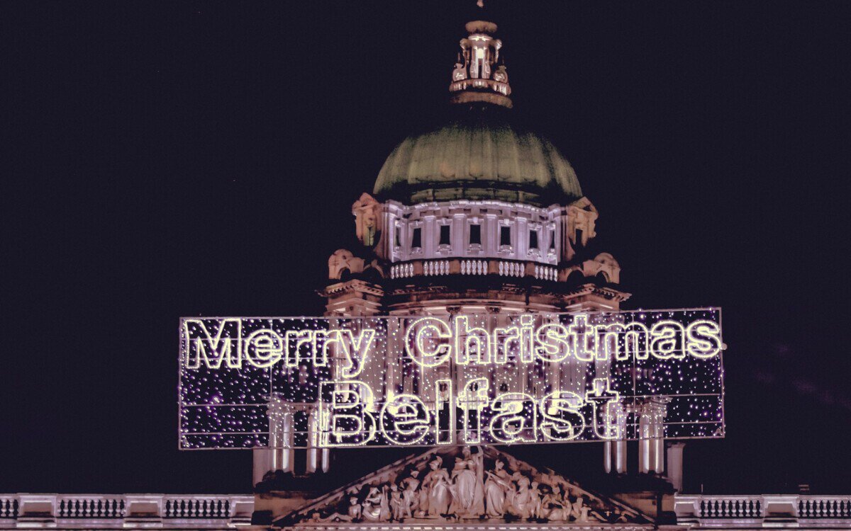Merry Christmas Belfast lights outside Belfast City Hall