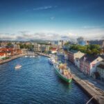 Panoramic view of Stavanger harbour, waterfront buildings and moored ships