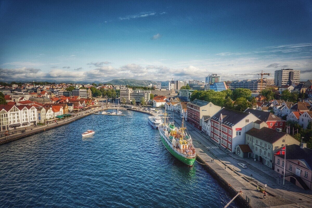 Panoramic view of Stavanger harbour, waterfront buildings and moored ships
