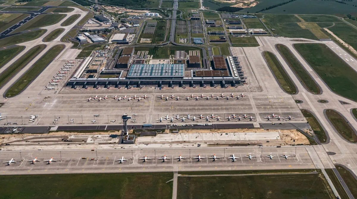 Aerial view of Berlin Brandenburg Airport terminal, runways and aircraft
