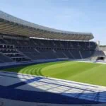 Inside Berlin Olympiastadion with the blue running track and football pitch