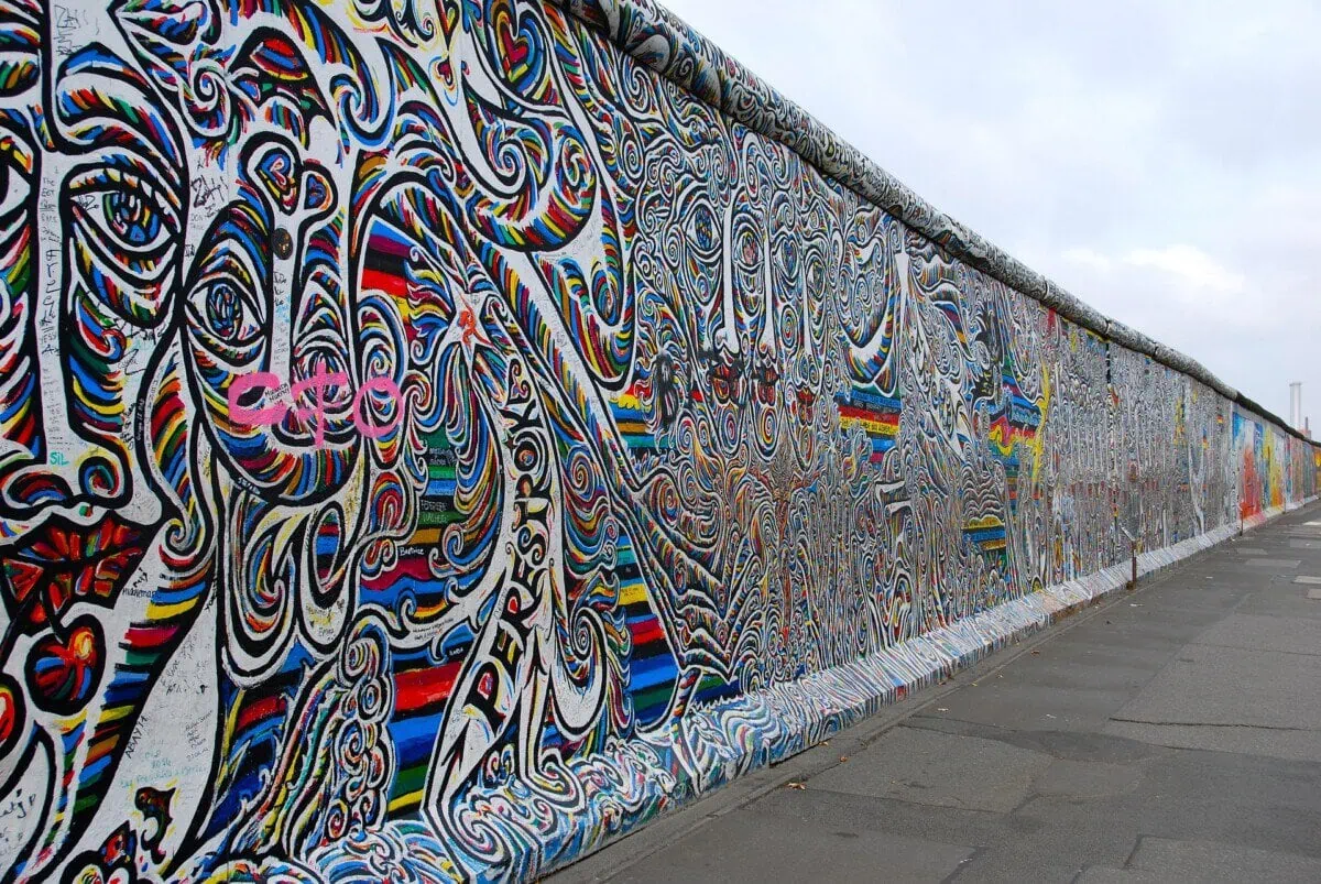 Colourful mural artwork on a surviving section of the Berlin Wall