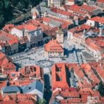 Aerial view of Council Square and the historic Old Town in Brașov, Romania
