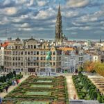Mont des Arts gardens with Brussels Town Hall tower visible across the city