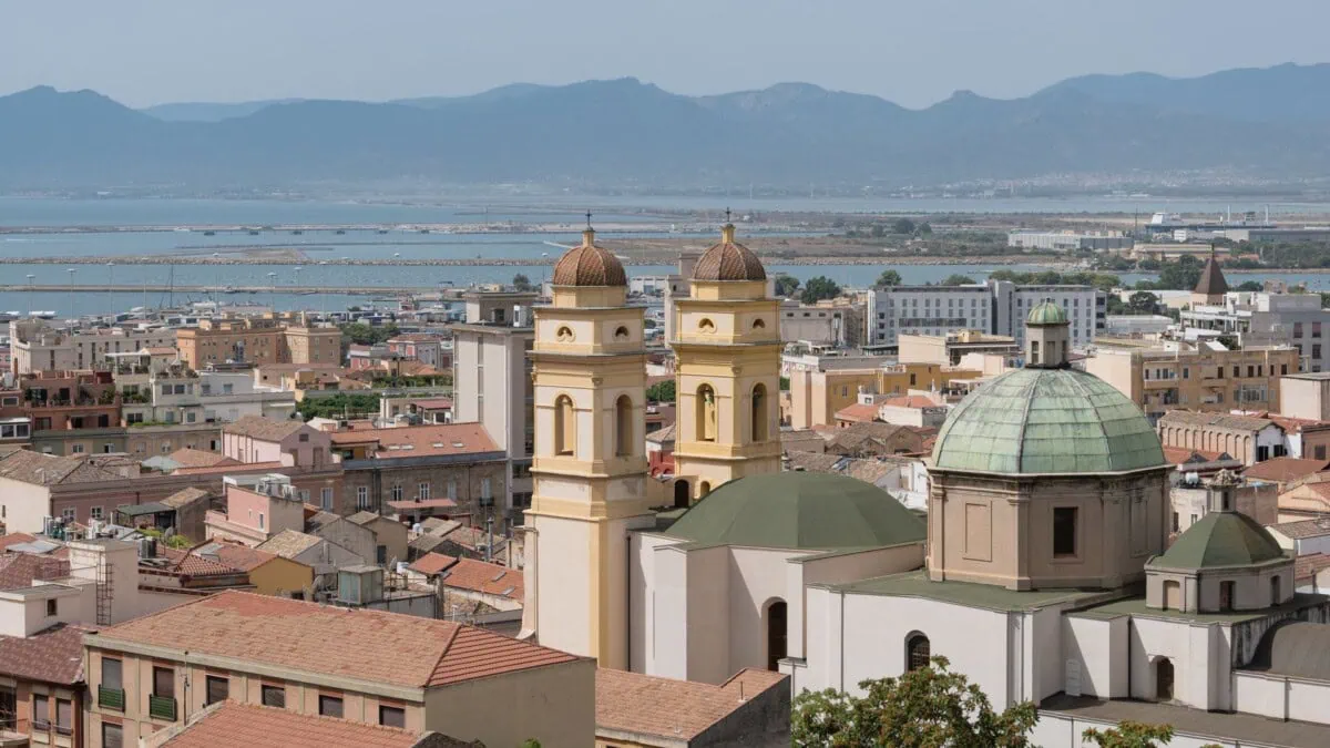 Cagliari city skyline with airport area and coastline beyond